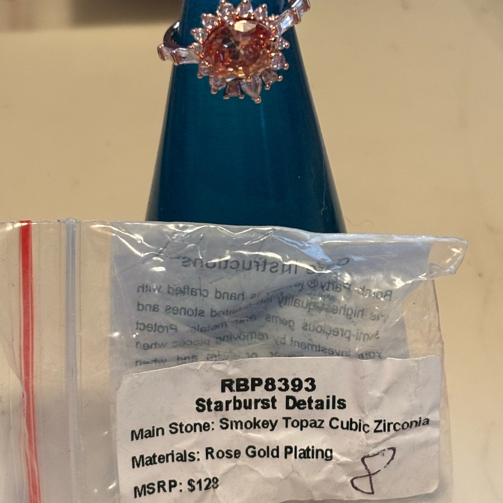 Rose Gold Starburst Ring with Smokey Topaz Cubic Zirconia